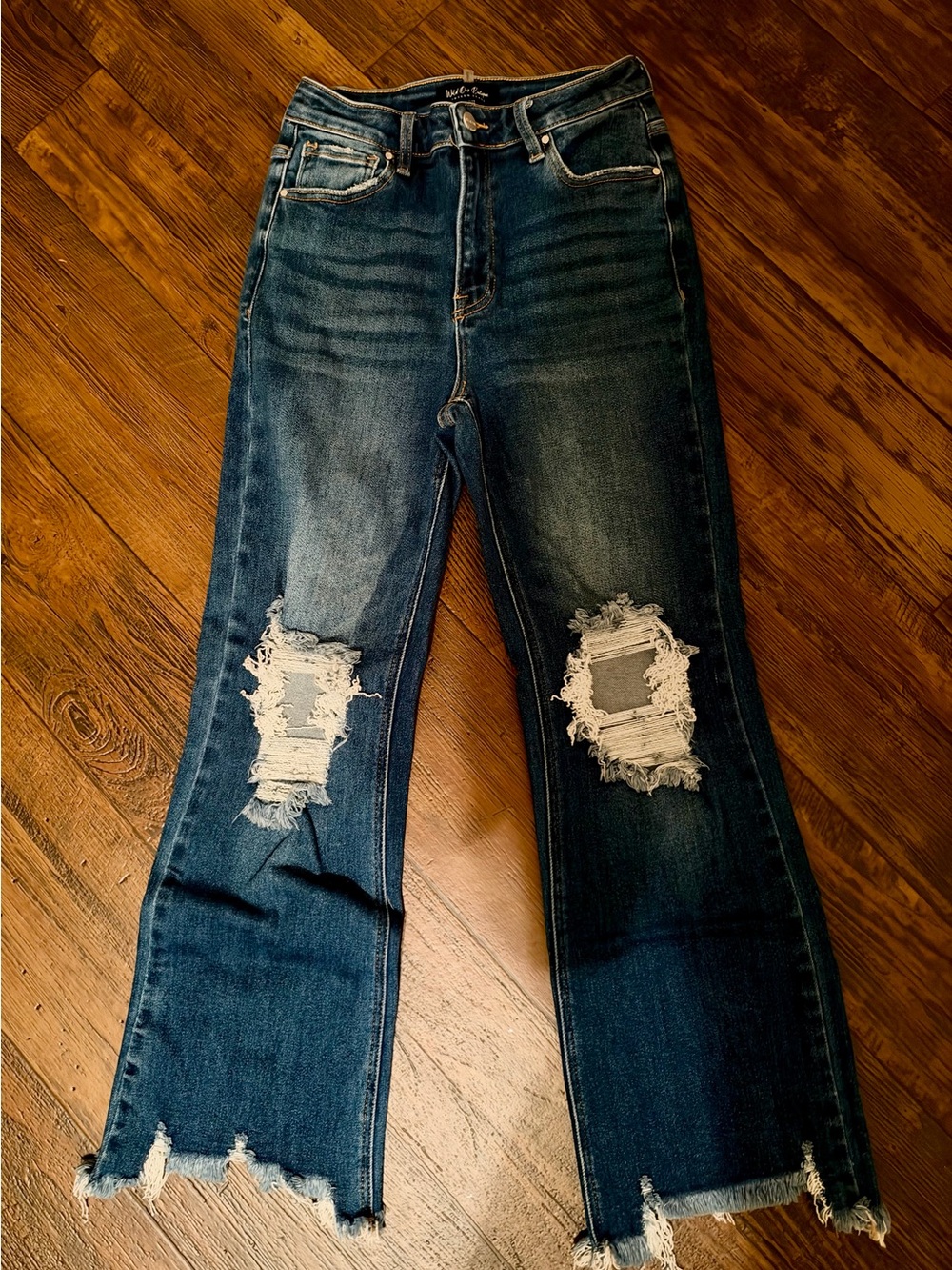 High-Rise Distressed Cropped Jeans in Dark Blue